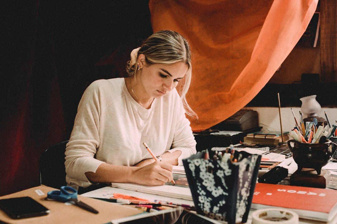 writer at desk with notes