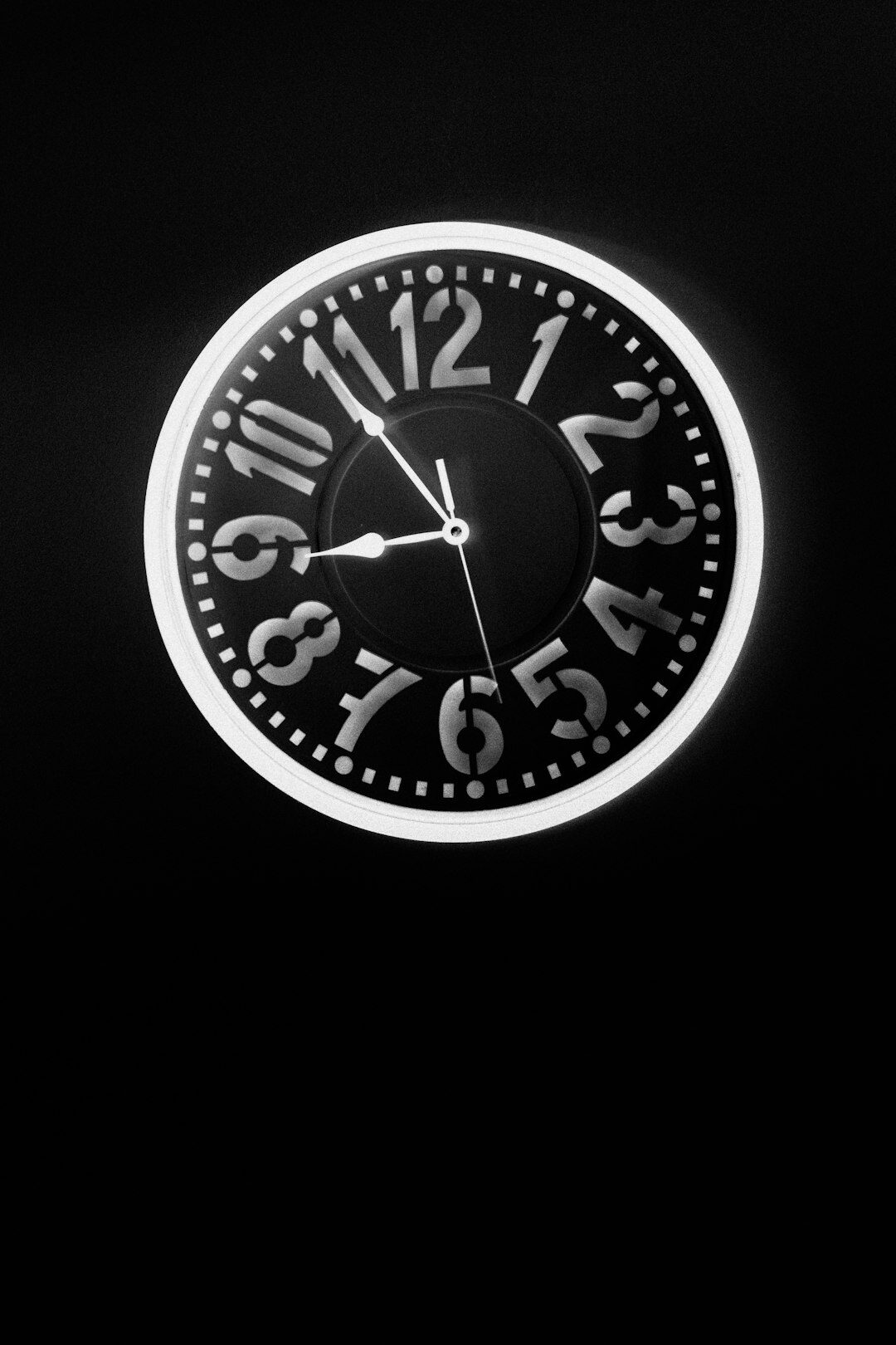clock ticking in dim light